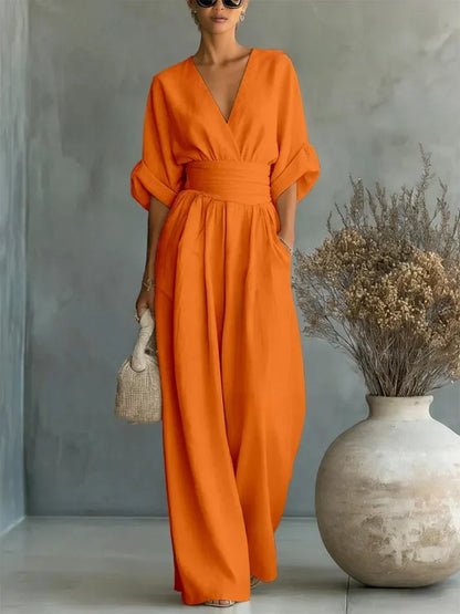 ESSENTIAL - Mono elegante de cintura alta con cuello en V