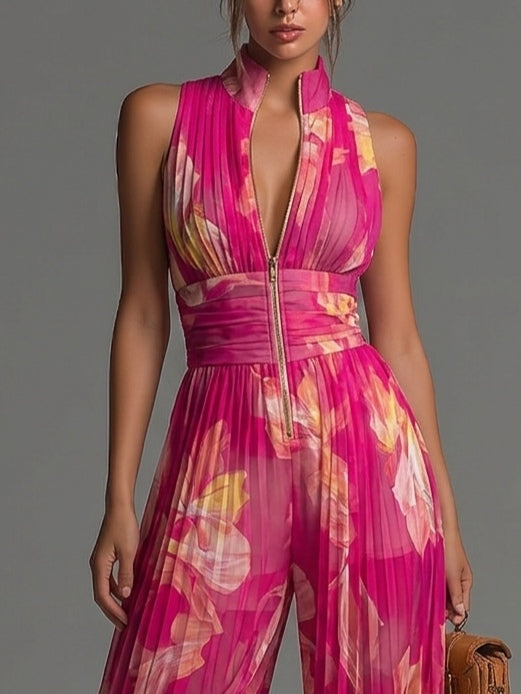 ESSENTIAL - Mono de gasa plisado con estampado floral fucsia