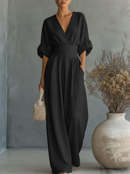 ESSENTIAL - Mono elegante de cintura alta con cuello en V